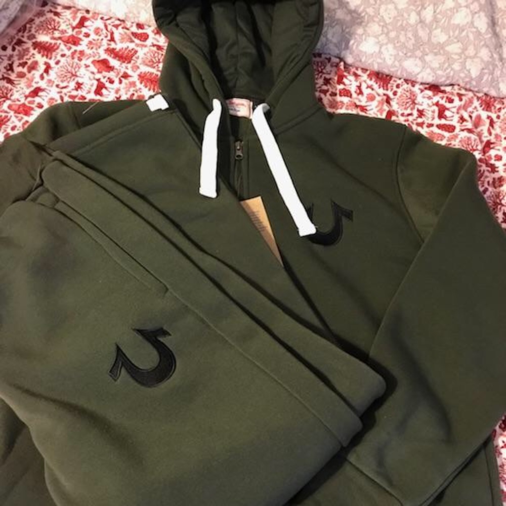 Green suit black logo